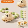 A toy snake game set shown on a light beige background, with the main cream-white snake head and body, green and cream segments, a cream-white remote control with orange buttons, and small accessory pieces. An orange label at the top reads 'CREAM WHITE' and quantity callouts 'X1', 'X8', and 'X1' appear beside the components.